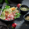 Healthy Nicoise salad as a balanced meal for health.